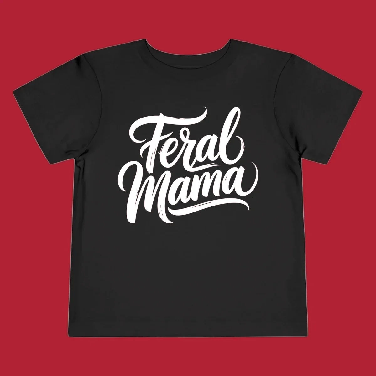 Bold black script text reading 'Feral Mama' with decorative flourishes, highlighting the feral mama script concept.
