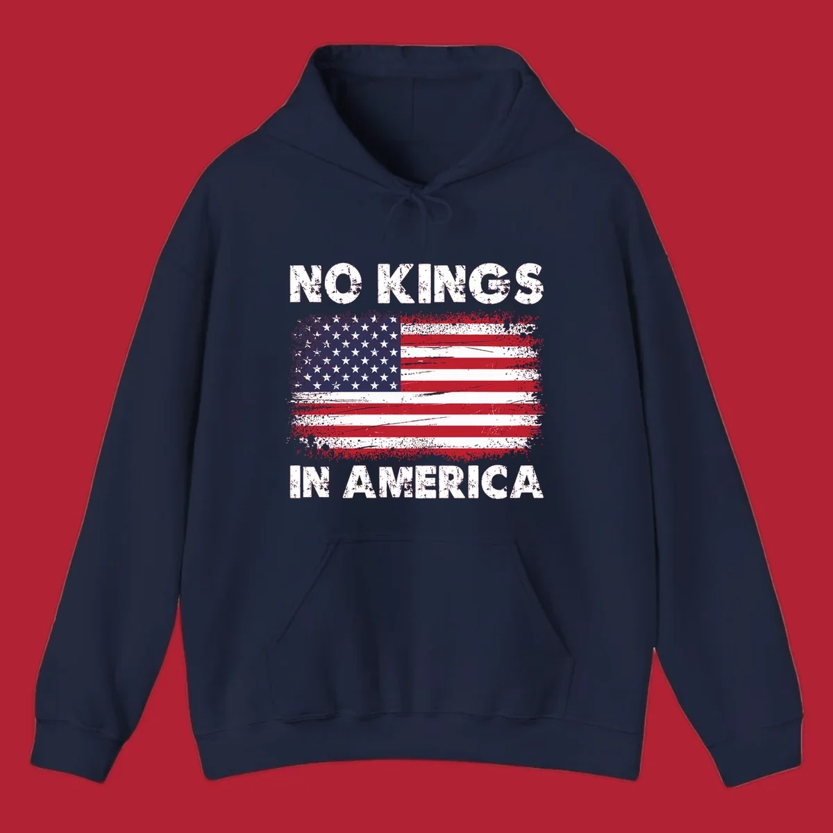 A distressed American flag with the white text 'NO KINGS IN AMERICA' above and below it.