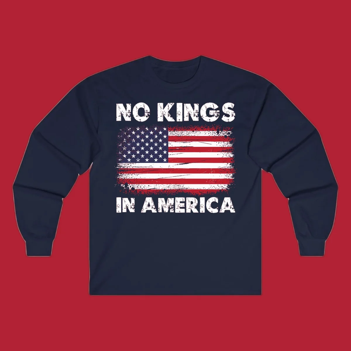 A distressed American flag with the white text 'NO KINGS IN AMERICA' above and below it.