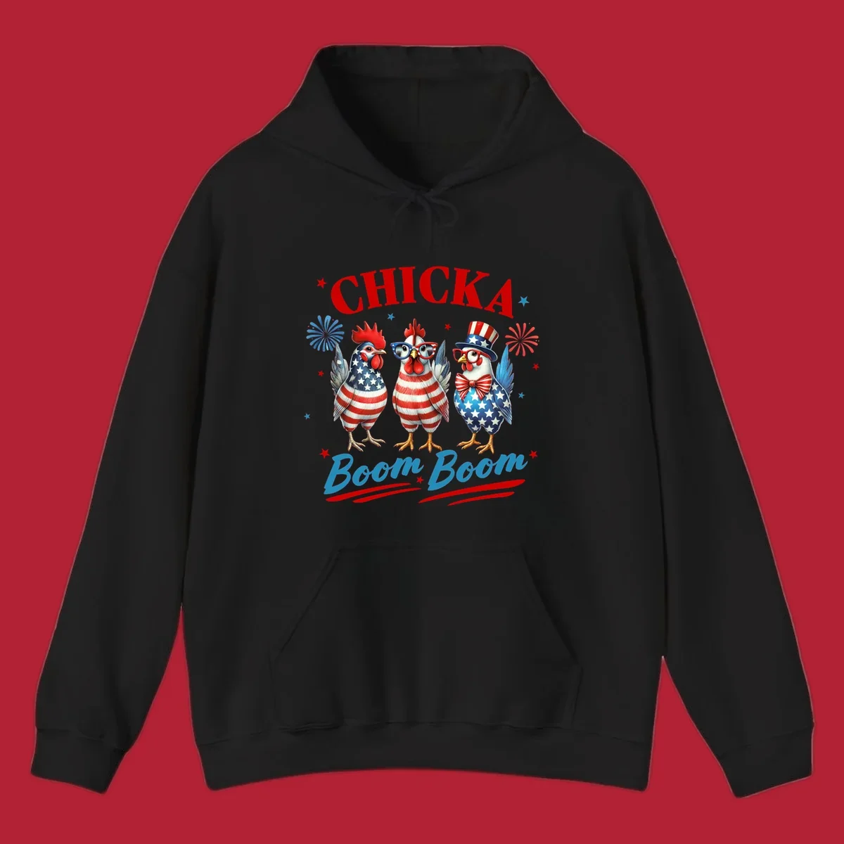 Three patriotic chickens in American flag patterns with fireworks and stars, text reads 'Chicka Boom Boom'. Features the chicka-boom-boom-patriotic-chickens concept.