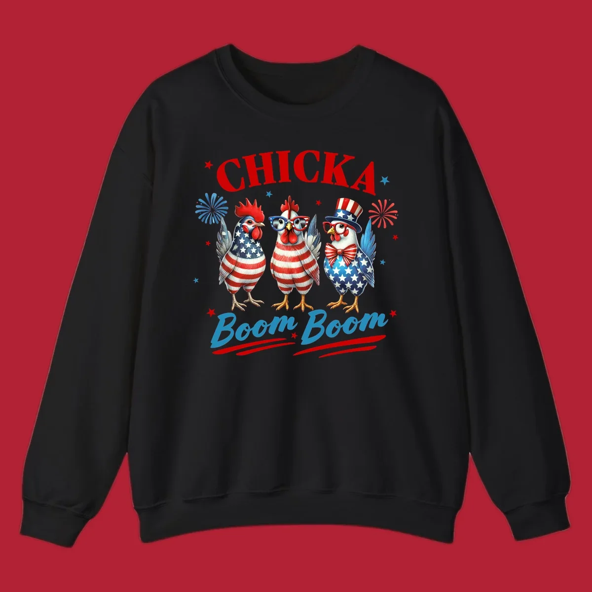Three patriotic chickens in American flag patterns with fireworks and stars, text reads 'Chicka Boom Boom'. Features the chicka-boom-boom-patriotic-chickens concept.