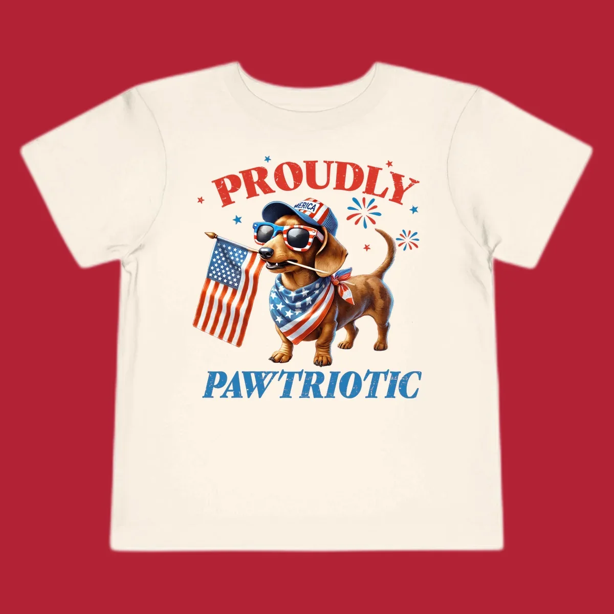 Proudly Pawtriotic Dachshund dog wearing sunglasses and a 'MERICA hat, holding an American flag.