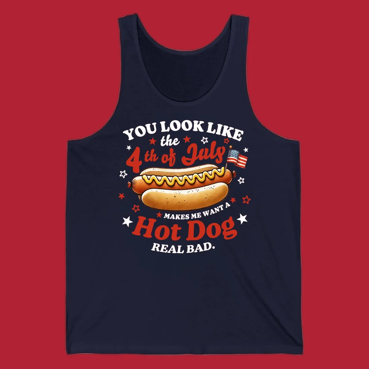 An illustrated hot dog with mustard, American flags, and stars. Text reads "YOU LOOK LIKE the 4th of July MAKES ME WANT A Hot Dog REAL BAD." you-look-like-4th-july design.