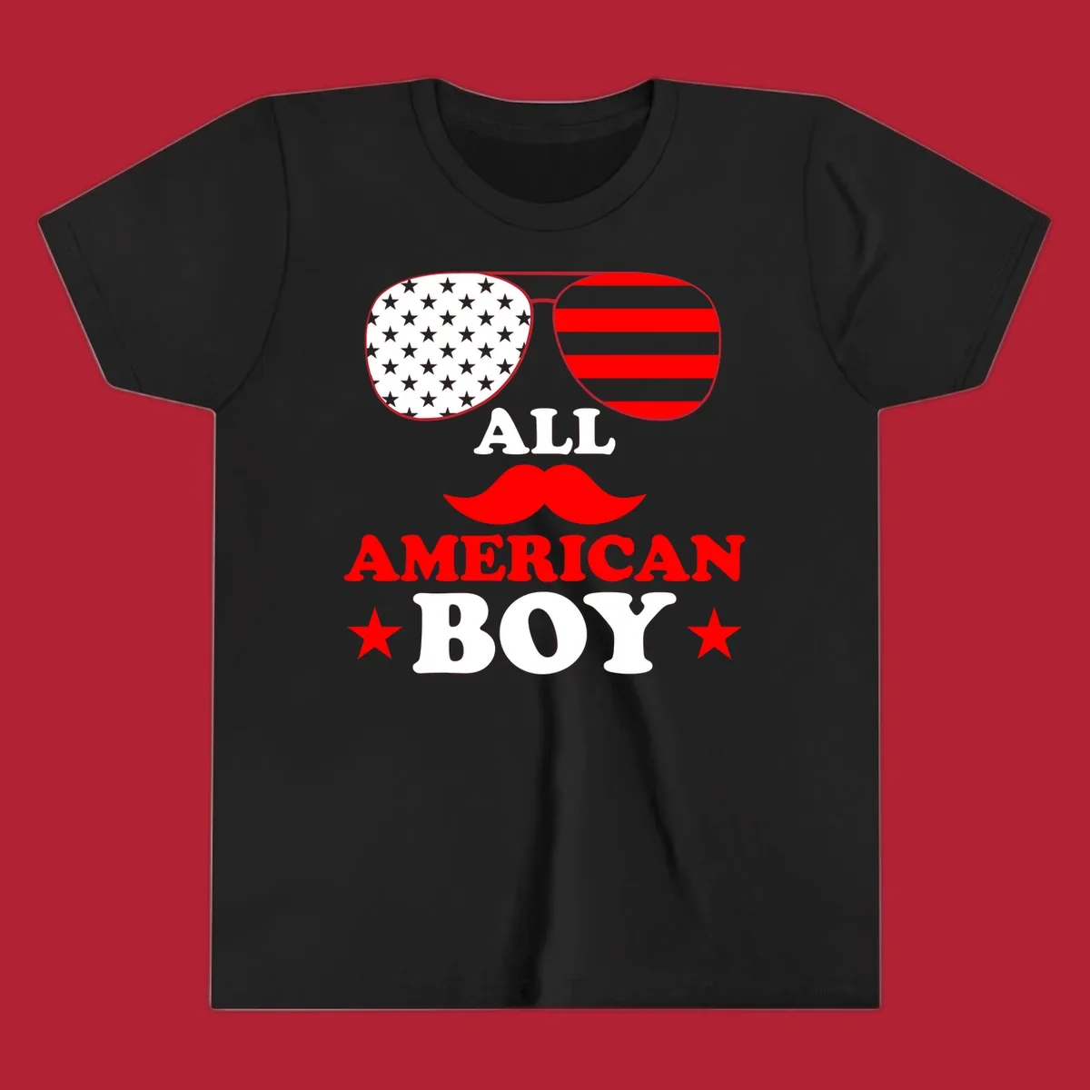 All American Boy patriotic design with aviator sunglasses featuring stars and stripes, a red mustache, and bold text.