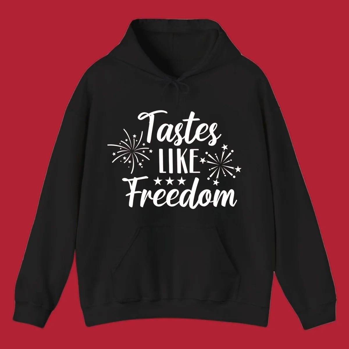 A patriotic design with the phrase 'Tastes LIKE Freedom' in script and block letters, surrounded by fireworks and stars.