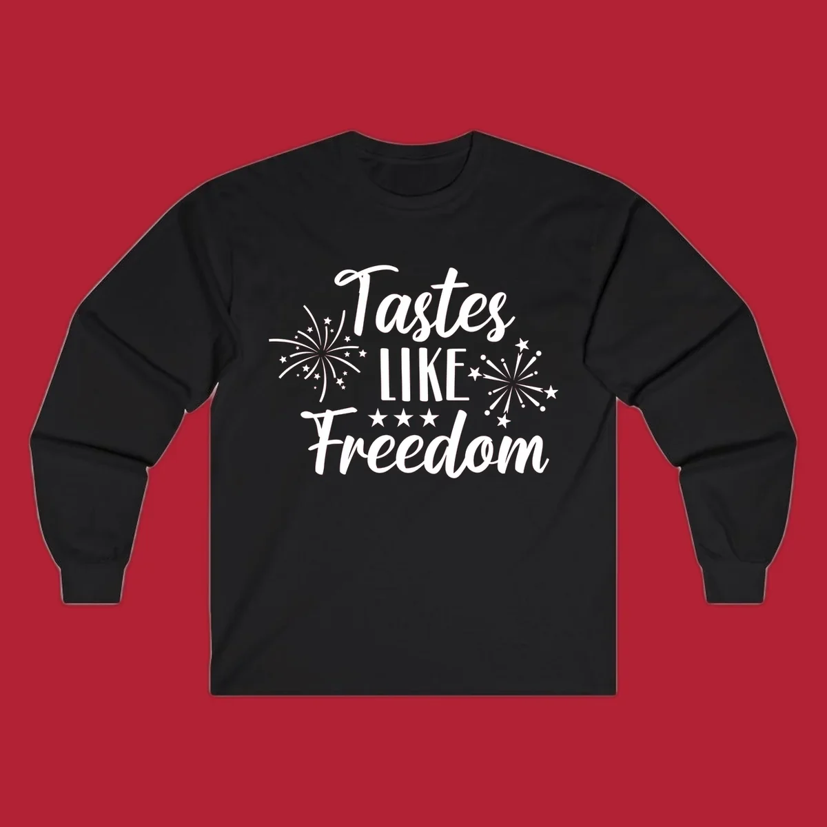 A patriotic design with the phrase 'Tastes LIKE Freedom' in script and block letters, surrounded by fireworks and stars.