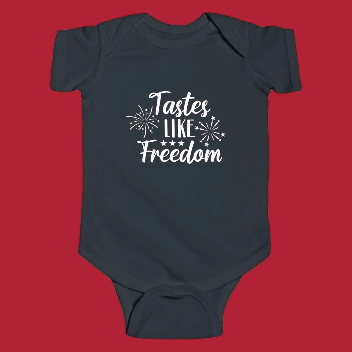 A patriotic design with the phrase 'Tastes LIKE Freedom' in script and block letters, surrounded by fireworks and stars.