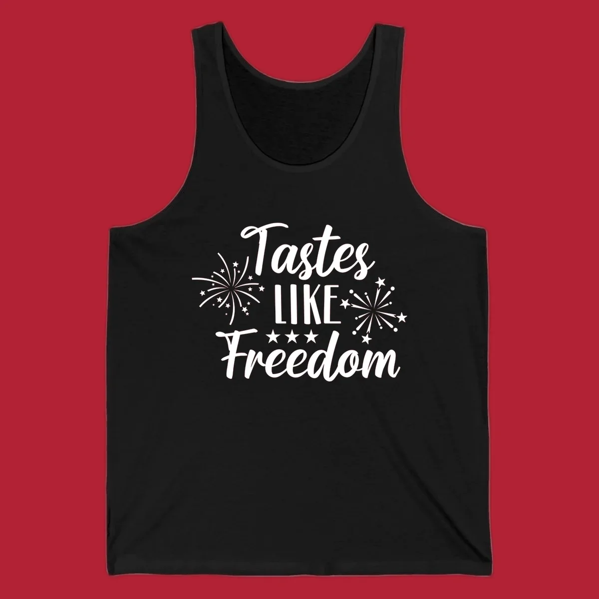 A patriotic design with the phrase 'Tastes LIKE Freedom' in script and block letters, surrounded by fireworks and stars.