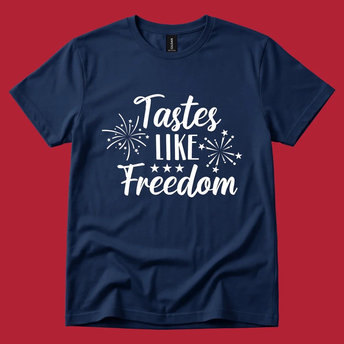 A patriotic design with the phrase 'Tastes LIKE Freedom' in script and block letters, surrounded by fireworks and stars.