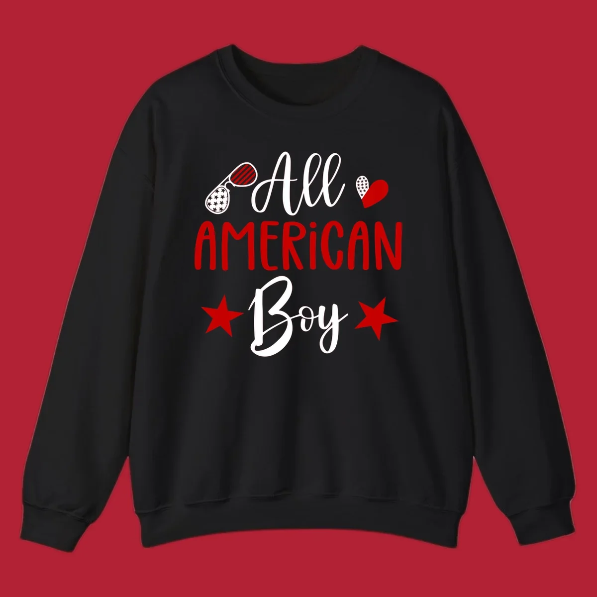 An 'All American Boy' design with patriotic sunglasses, a heart, and stars in red, white, and black.