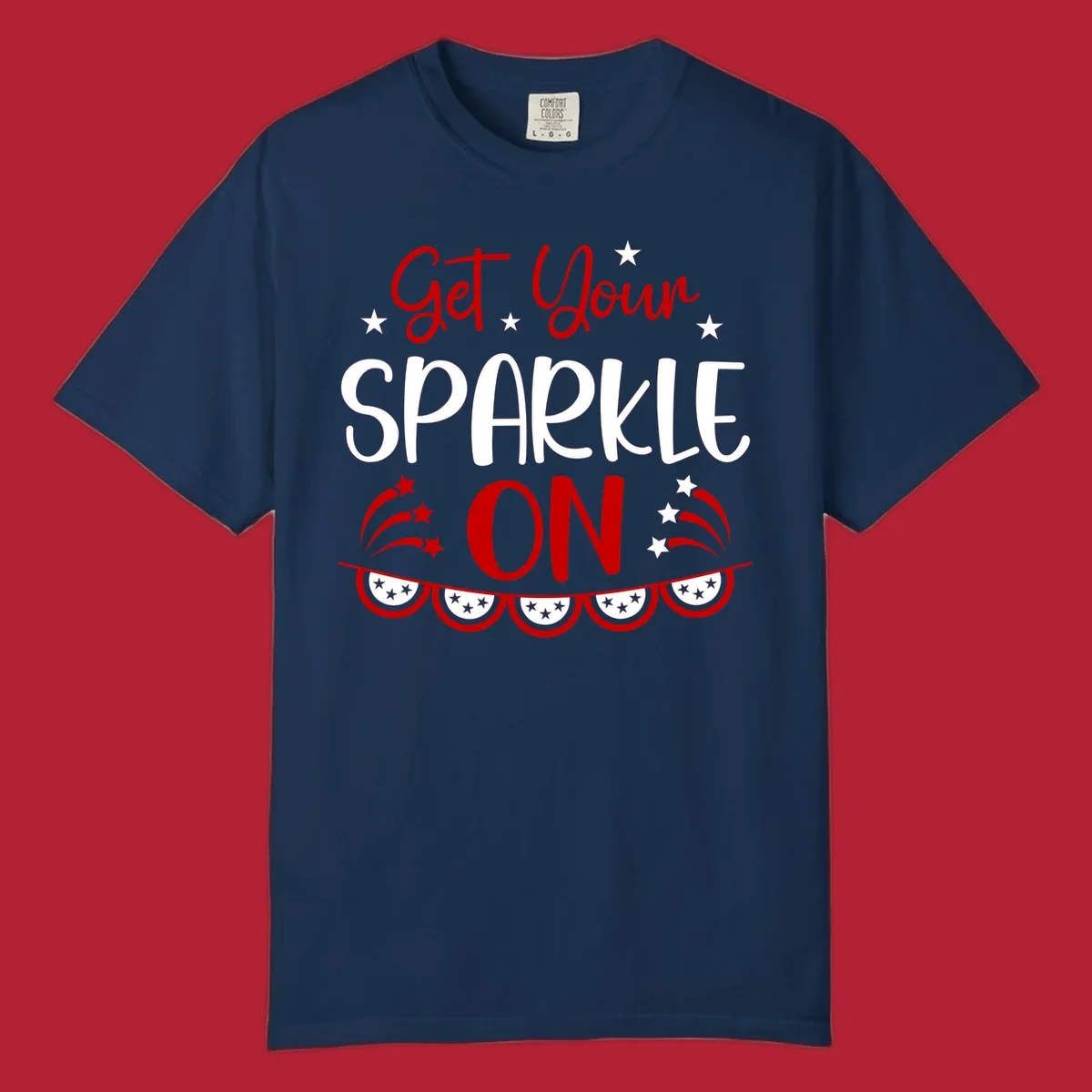 A patriotic design with the phrase 'Get Your SPARKLE ON' in red and blue, surrounded by white stars, fireworks, and bunting flags.