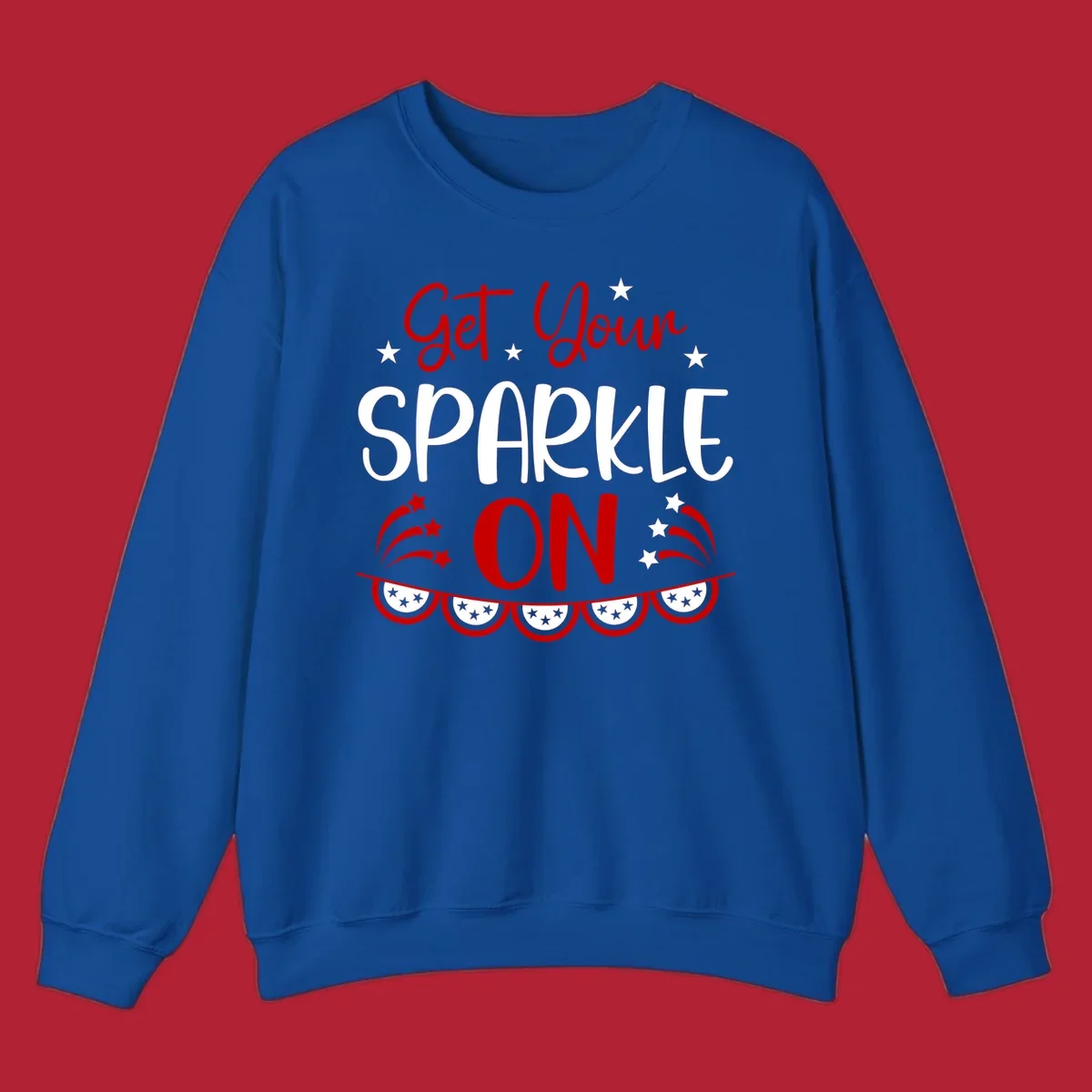 A patriotic design with the phrase 'Get Your SPARKLE ON' in red and blue, surrounded by white stars, fireworks, and bunting flags.