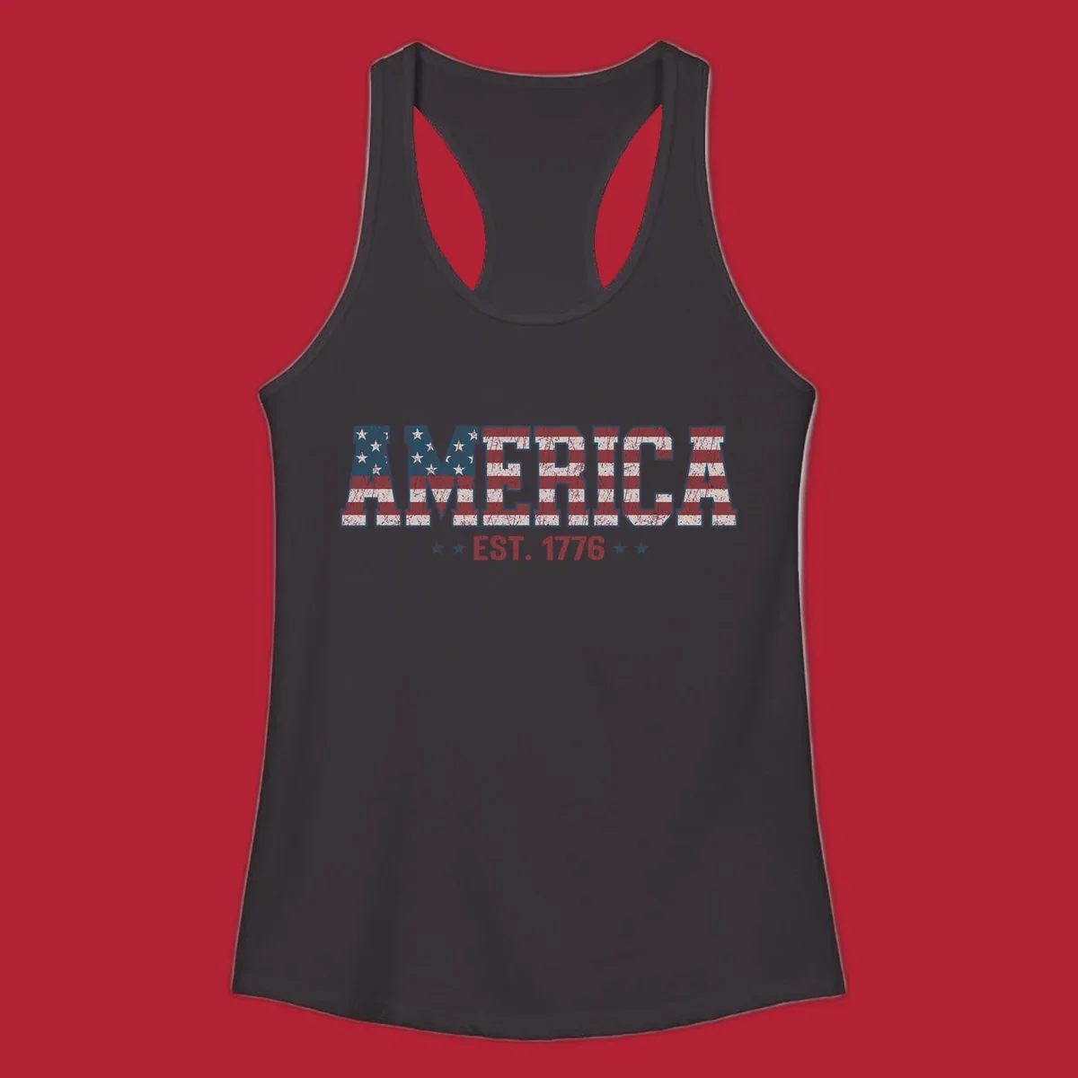 Distressed America Est. 1776 flag design with red, white, and blue flag pattern on block letters and stars.