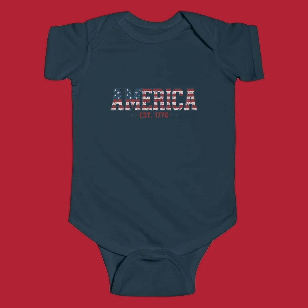 Distressed America Est. 1776 flag design with red, white, and blue flag pattern on block letters and stars.