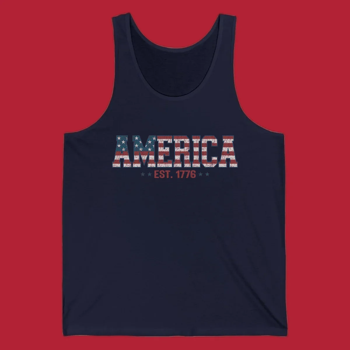 Distressed America Est. 1776 flag design with red, white, and blue flag pattern on block letters and stars.
