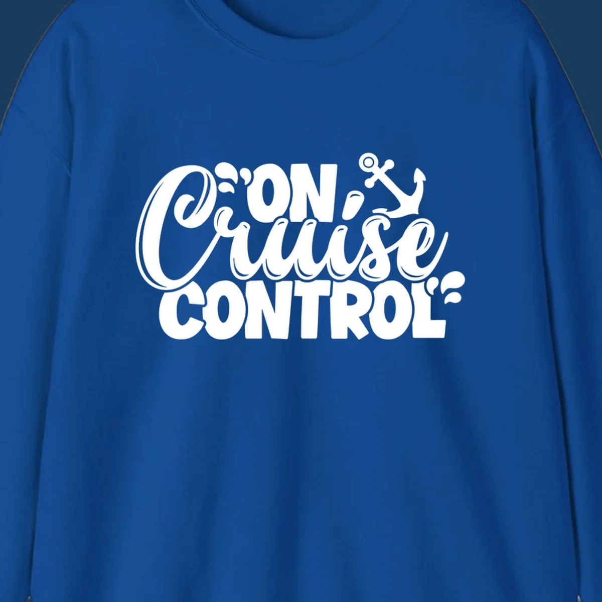 On Cruise Control text with anchor and water splashes graphic for a funny cruise shirt.