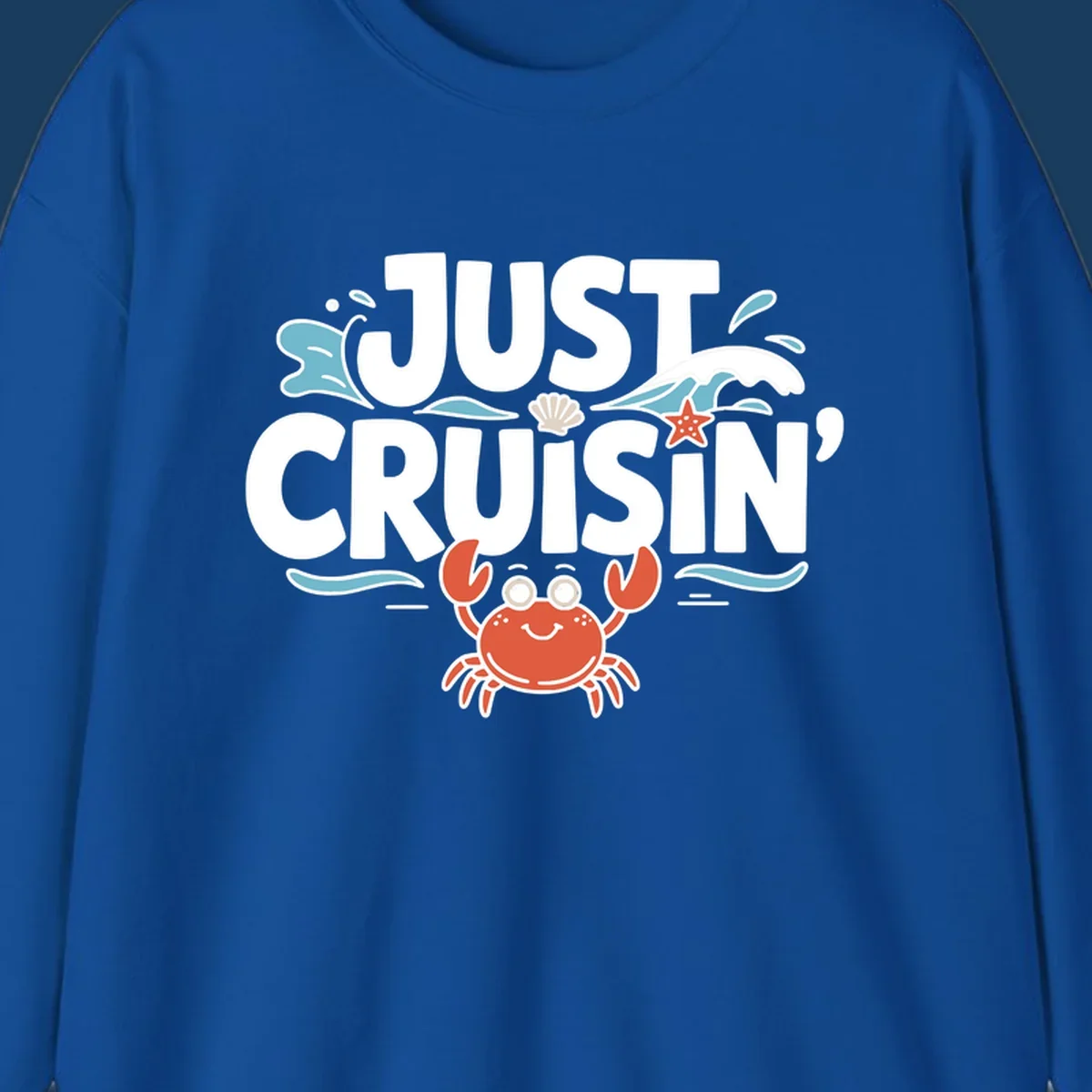 Just Cruisin crab design with waves, seashell, and starfish. Funny cruise vacation theme.