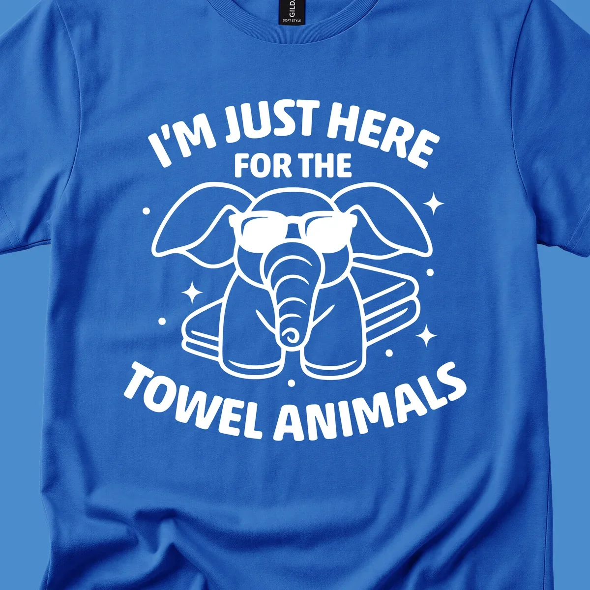 Illustration of a towel elephant wearing sunglasses with text 'I'm Just Here For The Towel Animals'.