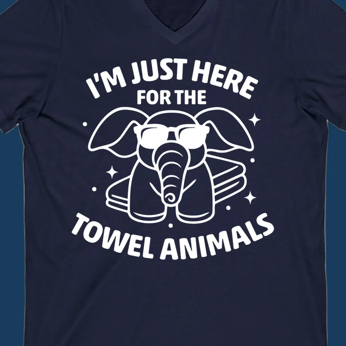 Illustration of a towel elephant wearing sunglasses with text 'I'm Just Here For The Towel Animals'.