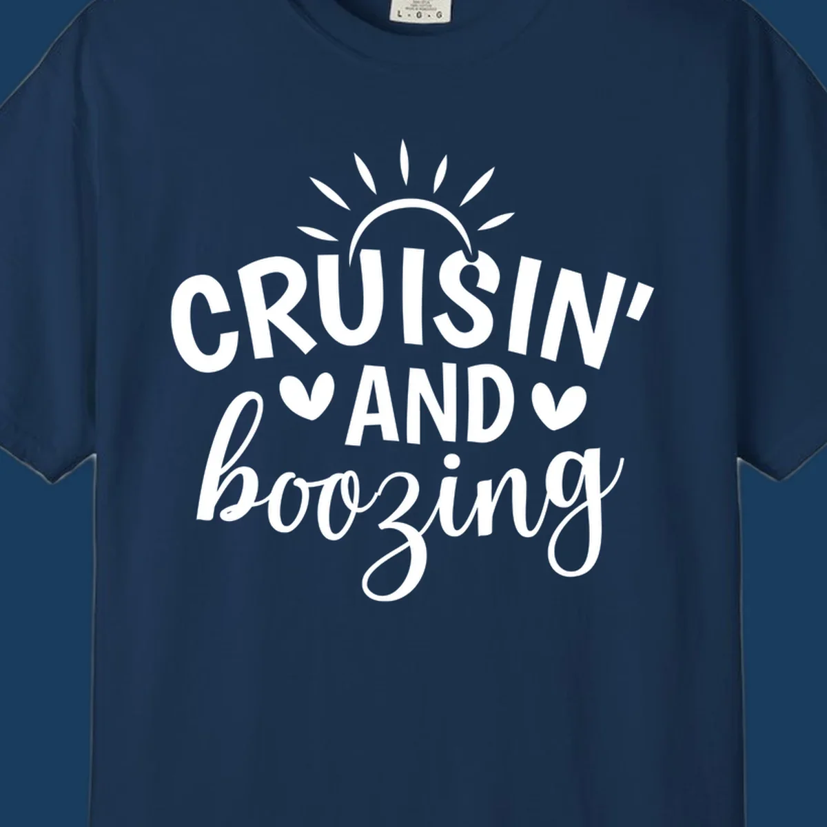 Cruisin' and Boozing text with sun and hearts graphic for a funny cruise shirt.