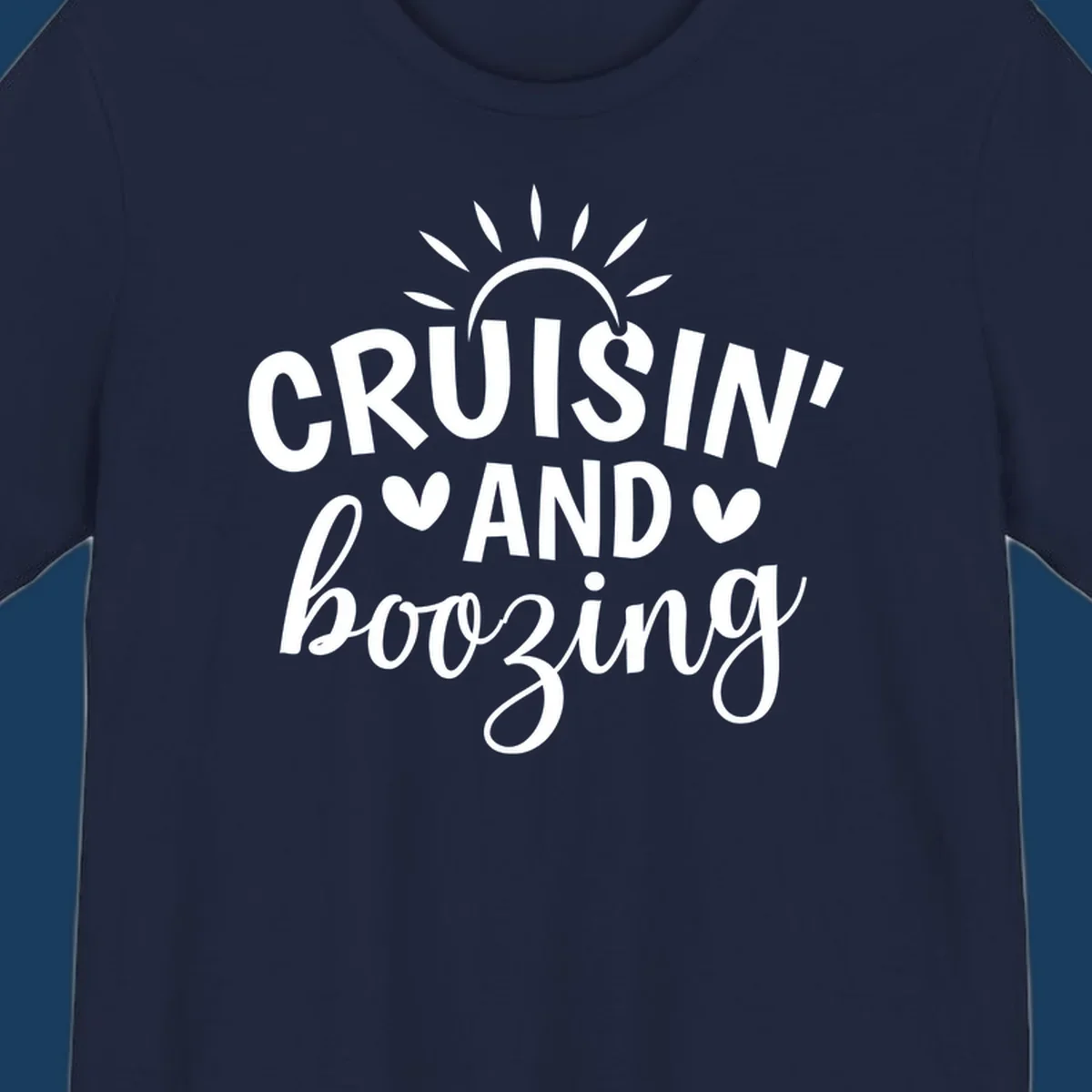Cruisin' and Boozing text with sun and hearts graphic for a funny cruise shirt.