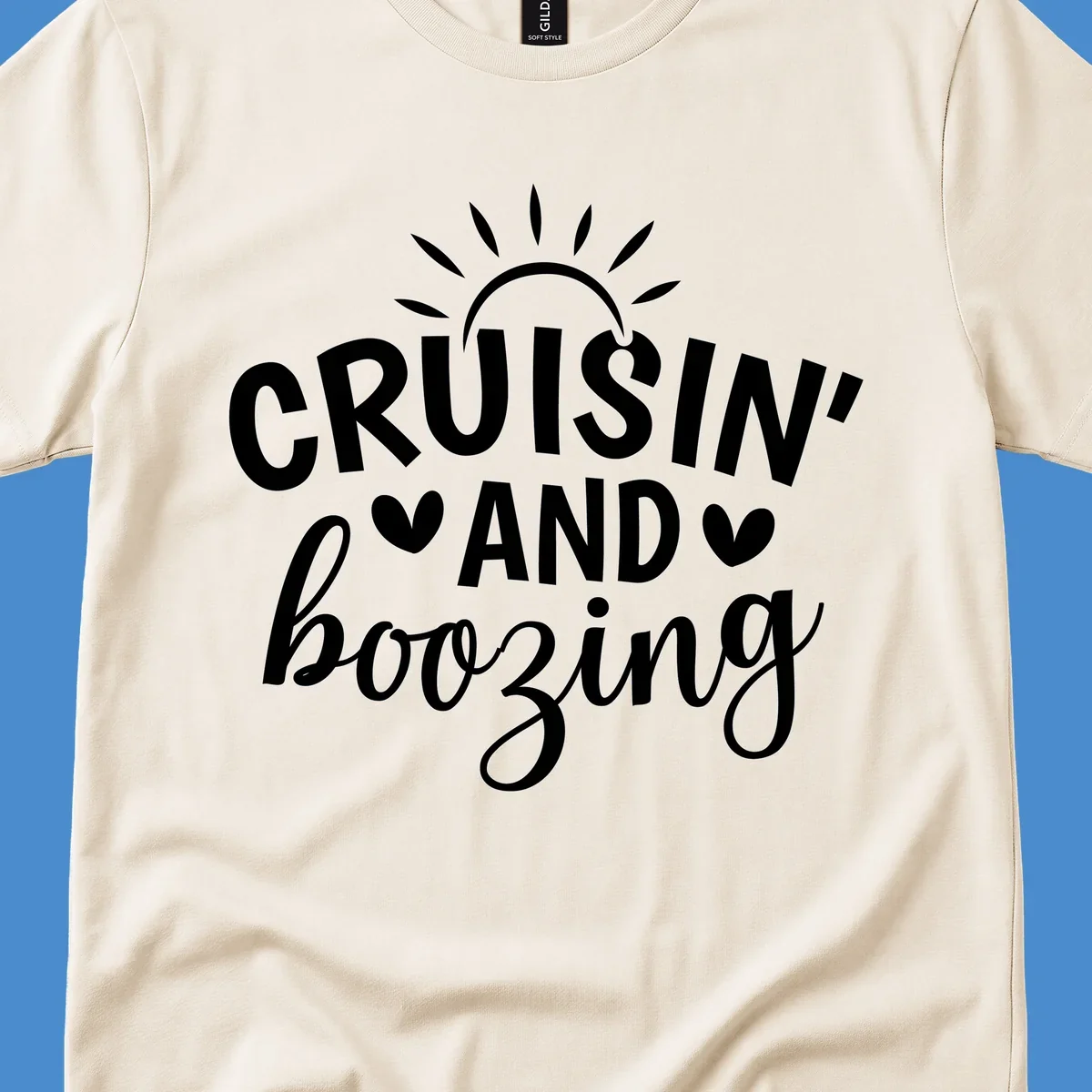 Cruisin' and Boozing text with sun and hearts graphic for a funny cruise shirt.
