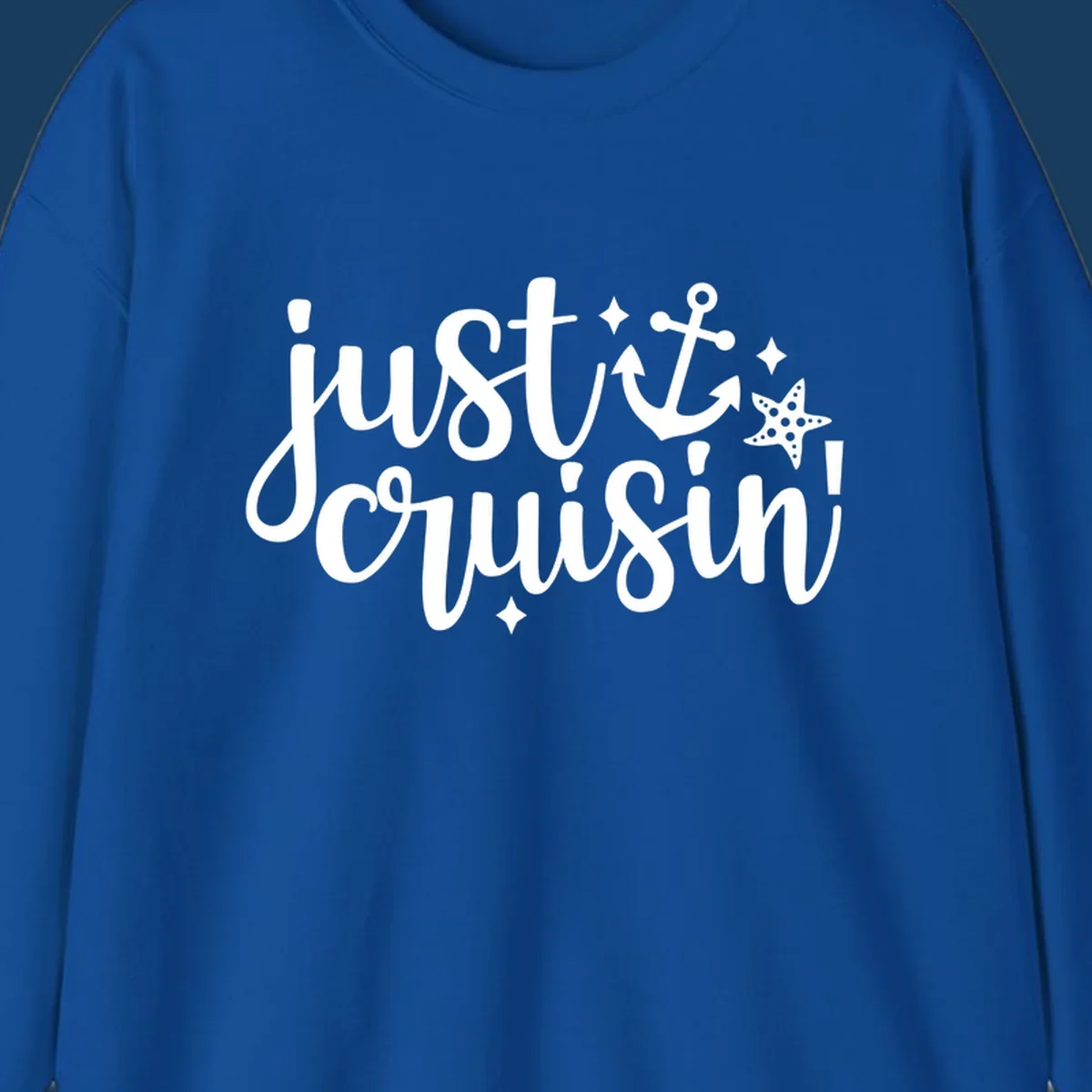 Just Cruisin' nautical anchor and starfish design in white.