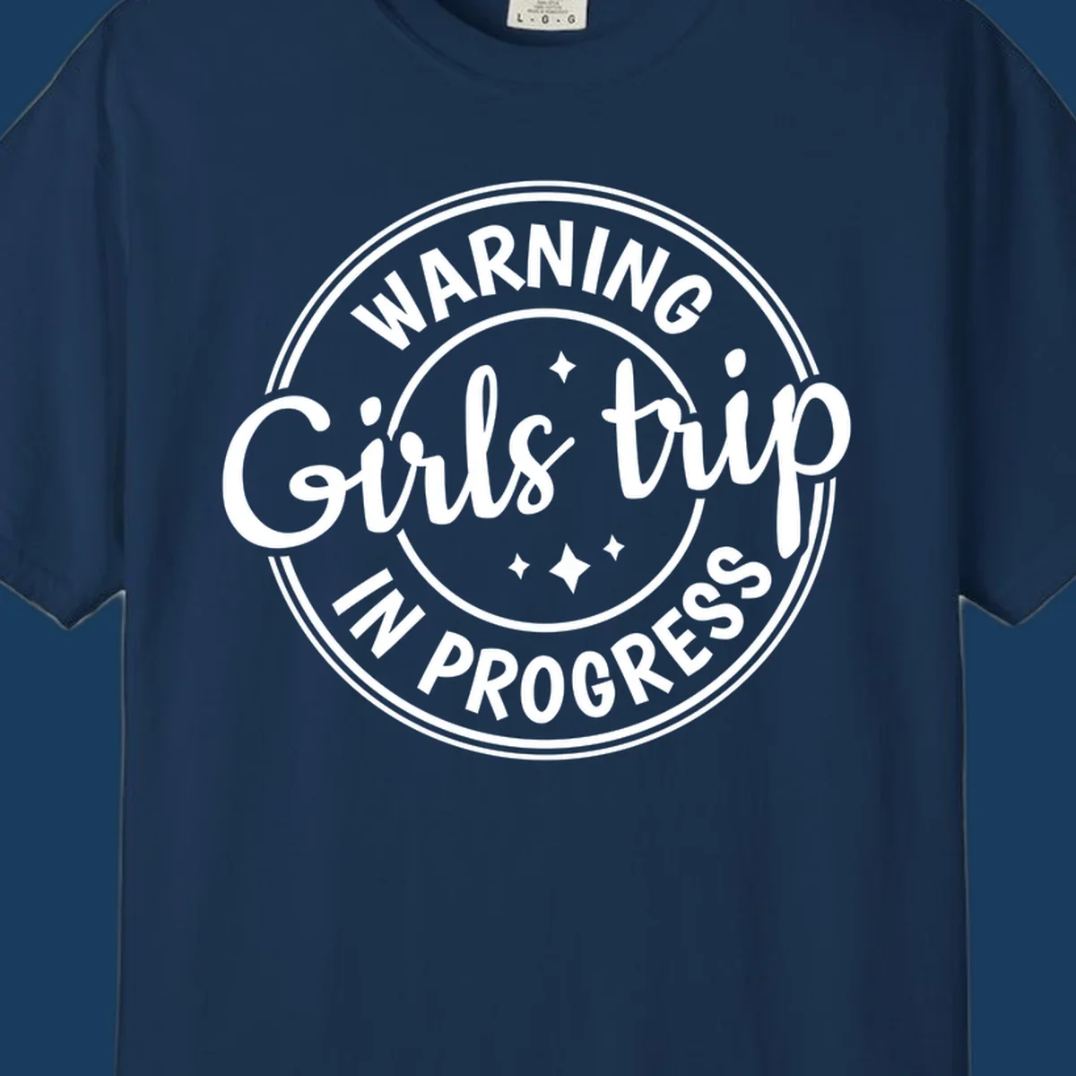 Girls trip in progress warning badge design with text and stars.