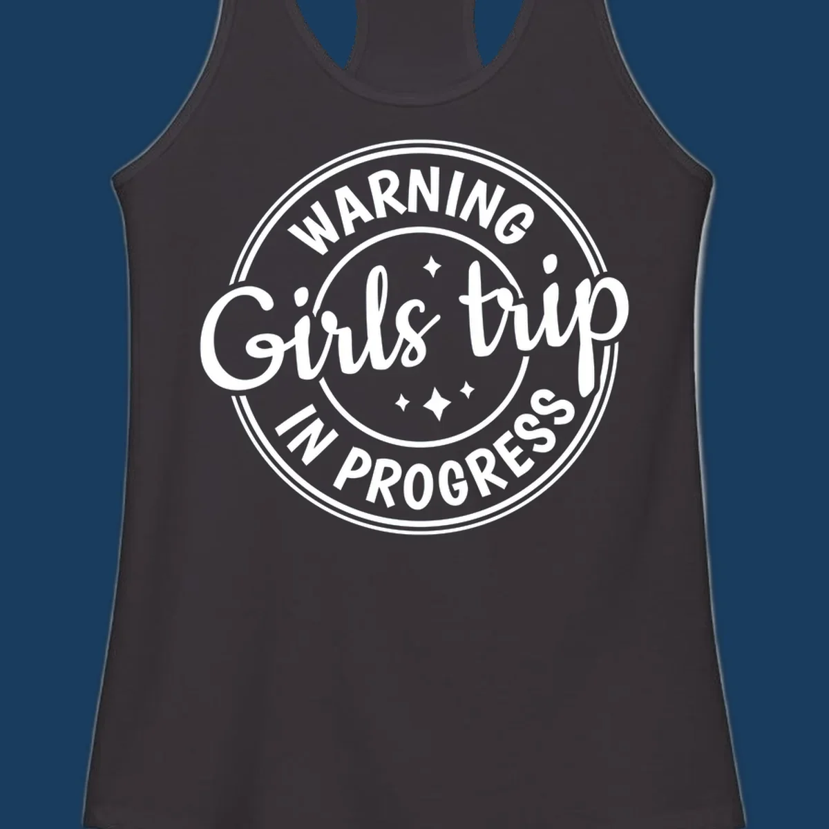 Girls trip in progress warning badge design with text and stars.