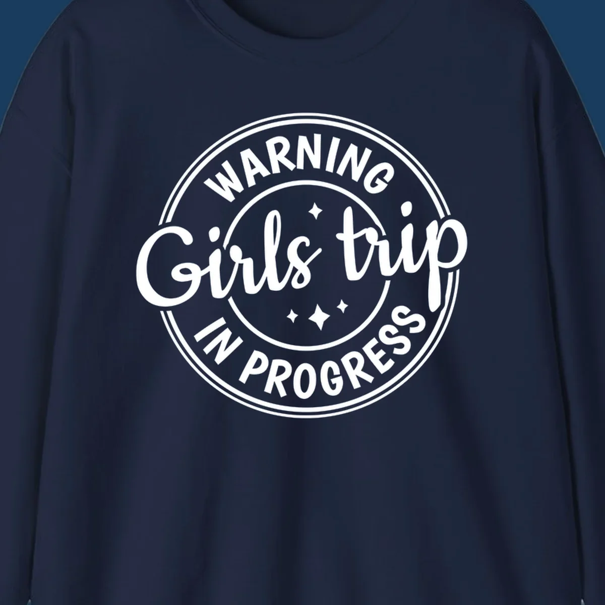 Girls trip in progress warning badge design with text and stars.