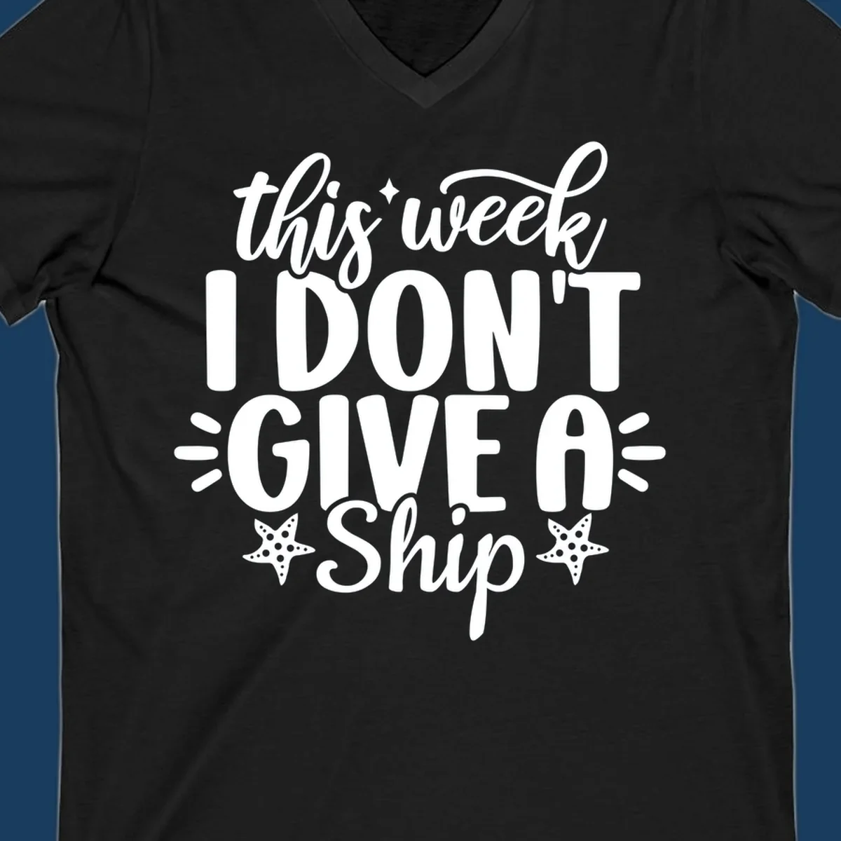 This Week I Don't Give A Ship text design with starfish and sparkles.