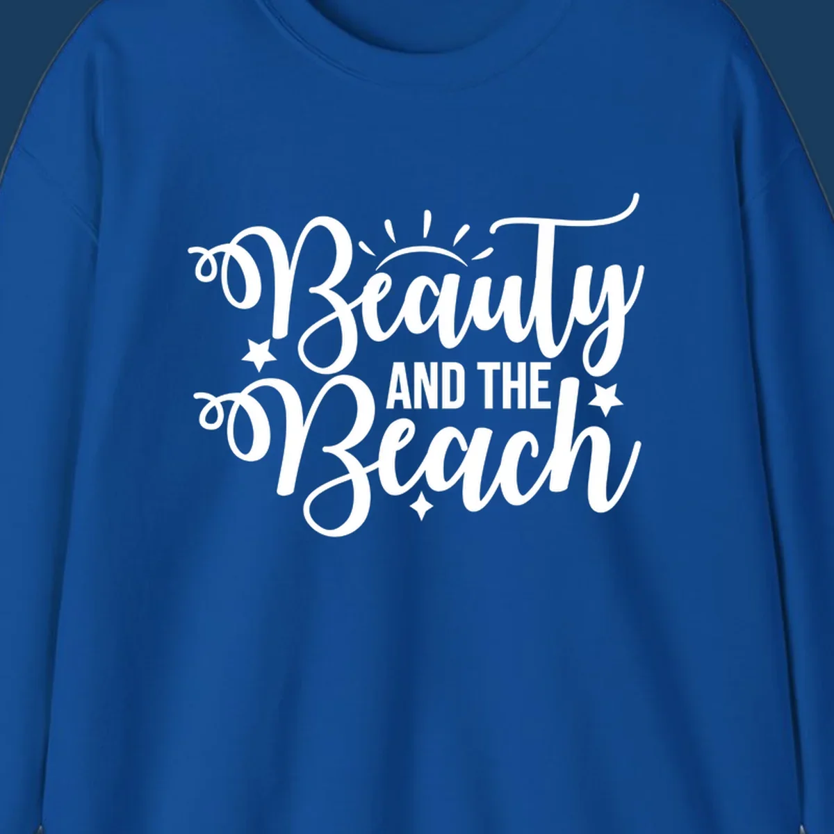 Beauty and the Beach text design with sun rays and stars.