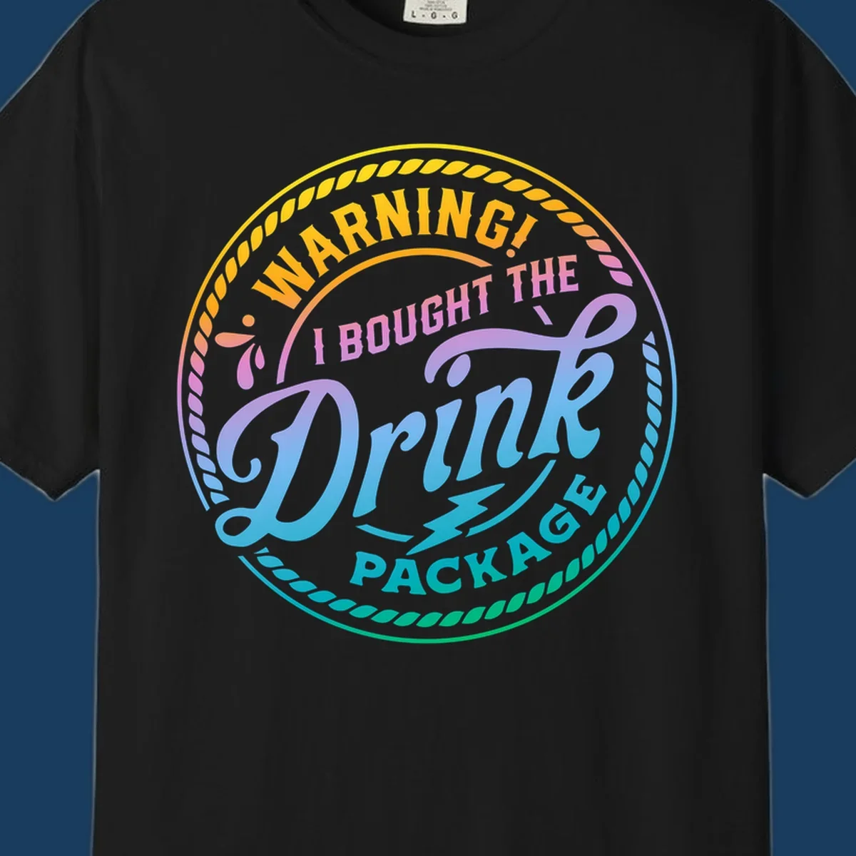 Warning I Bought The Drink Package circular badge design with colorful gradient text.