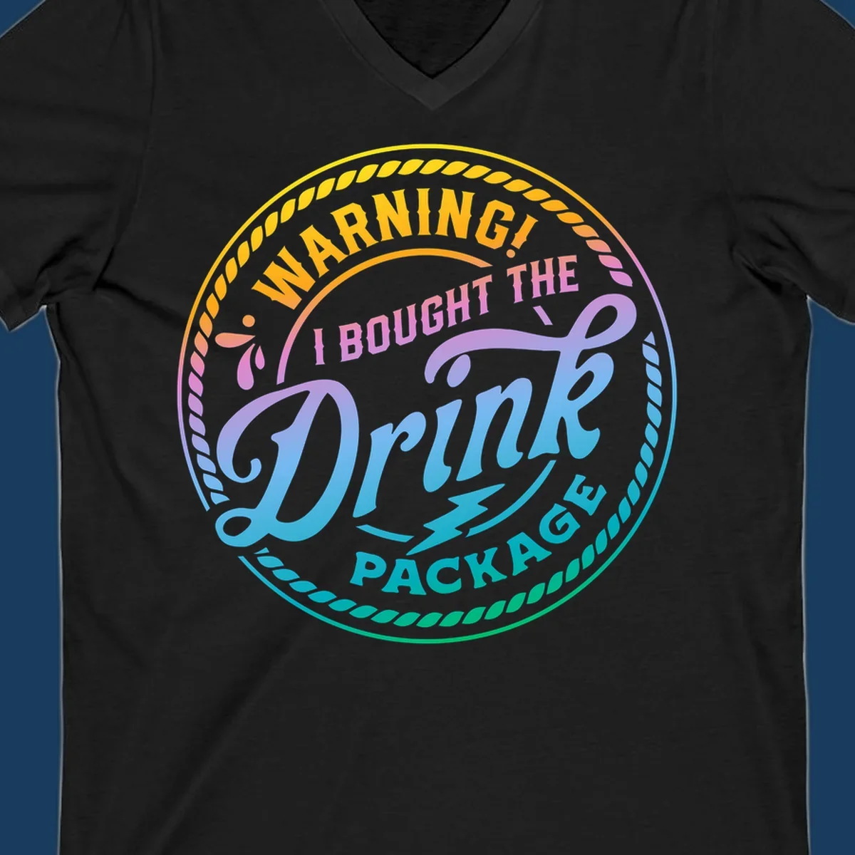 Warning I Bought The Drink Package circular badge design with colorful gradient text.