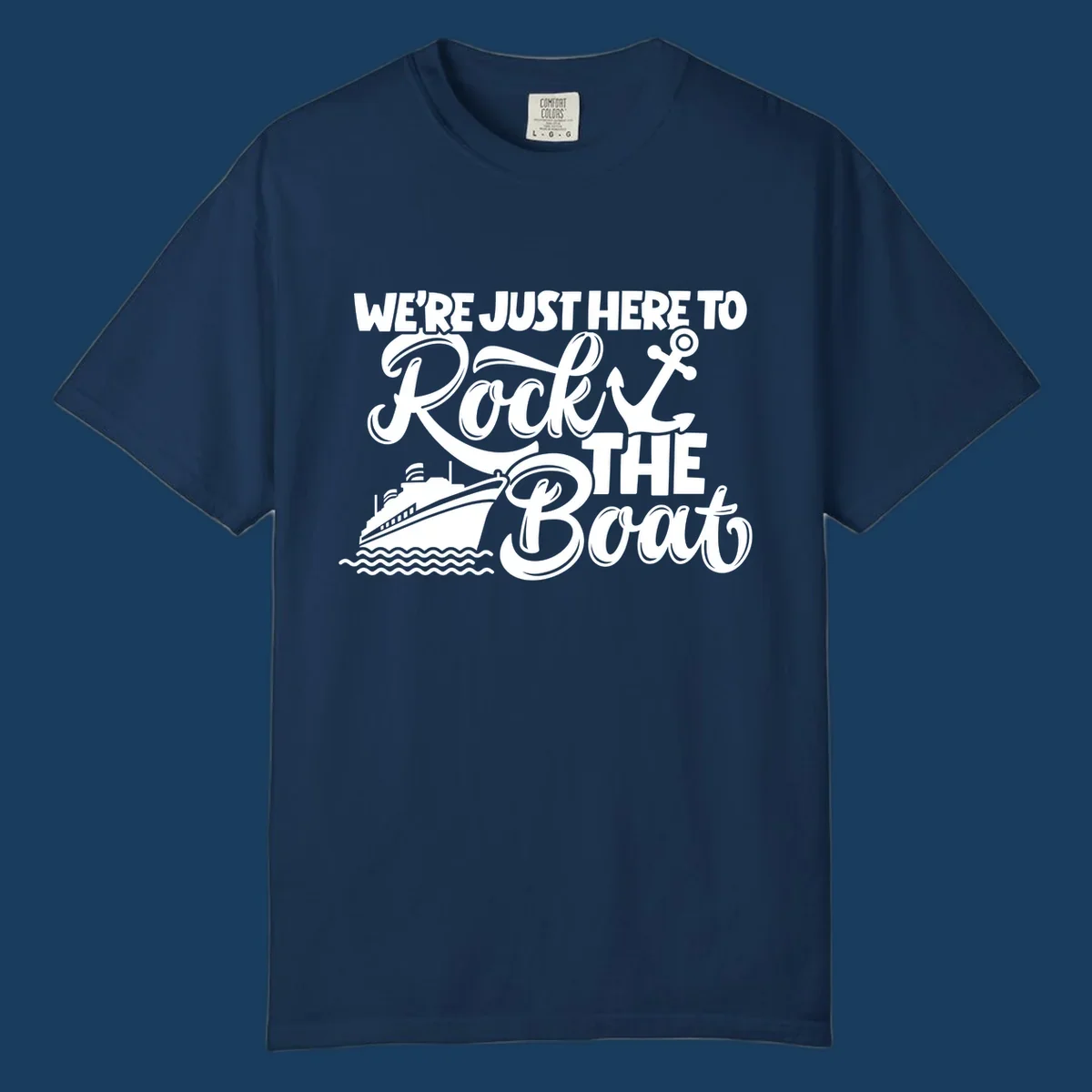 Graphic text design 'We're Just Here To Rock The Boat' with a cruise ship and anchor.