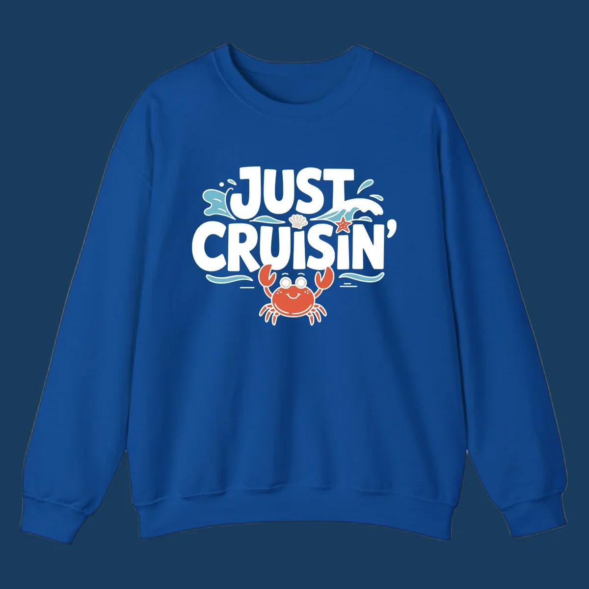 Just Cruisin crab design with waves, seashell, and starfish. Funny cruise vacation theme.