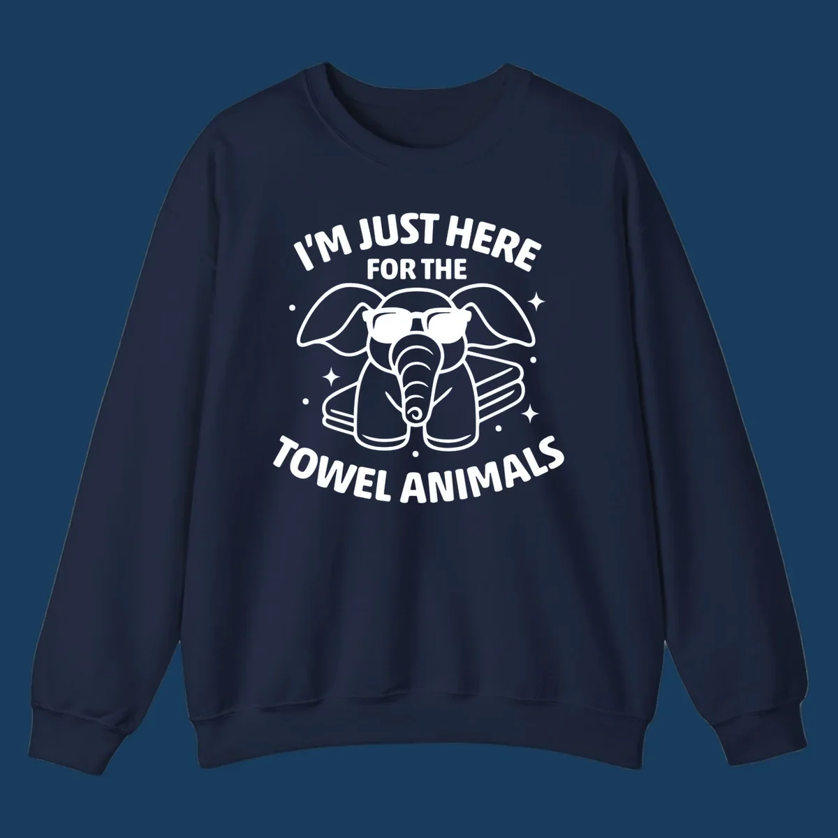 Illustration of a towel elephant wearing sunglasses with text 'I'm Just Here For The Towel Animals'.