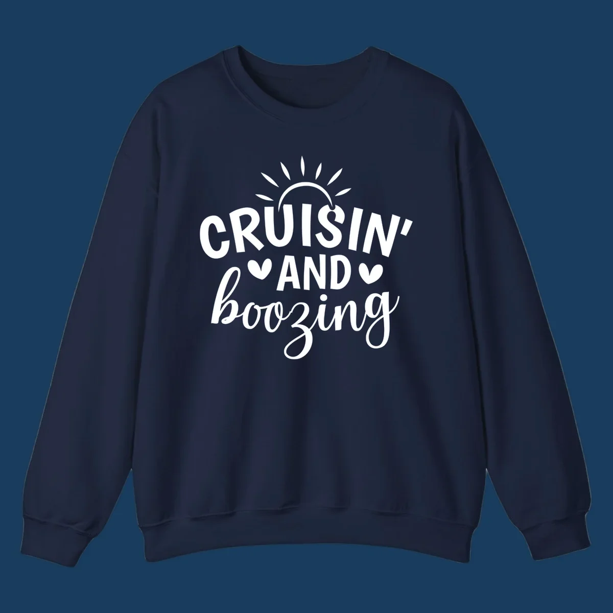 Cruisin' and Boozing text with sun and hearts graphic for a funny cruise shirt.