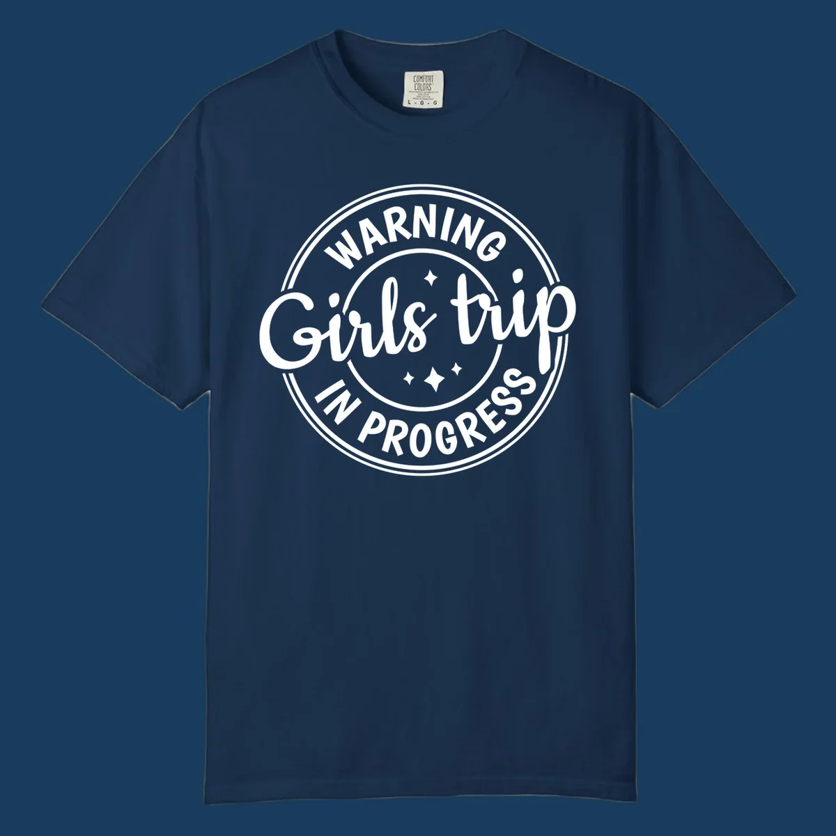 Girls trip in progress warning badge design with text and stars.