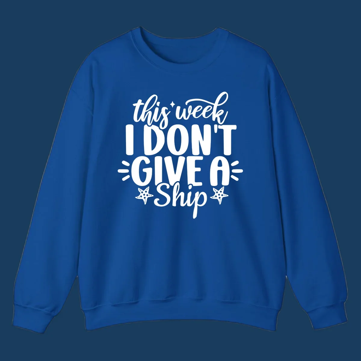 This Week I Don't Give A Ship text design with starfish and sparkles.