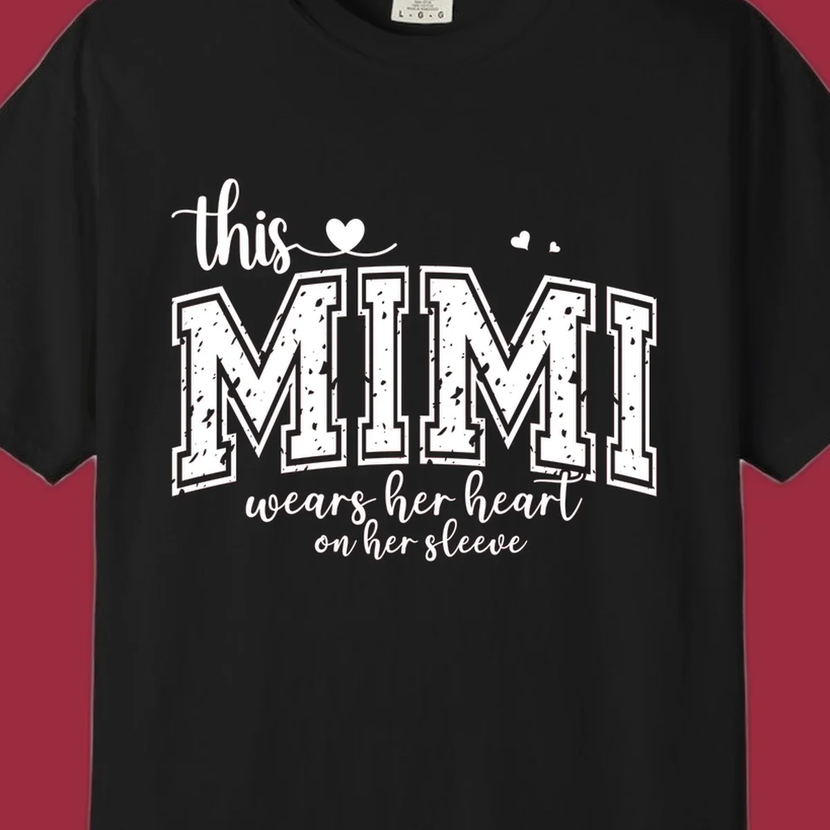 This Mimi Wears Her Heart On Her Sleeve text design with heart icons.