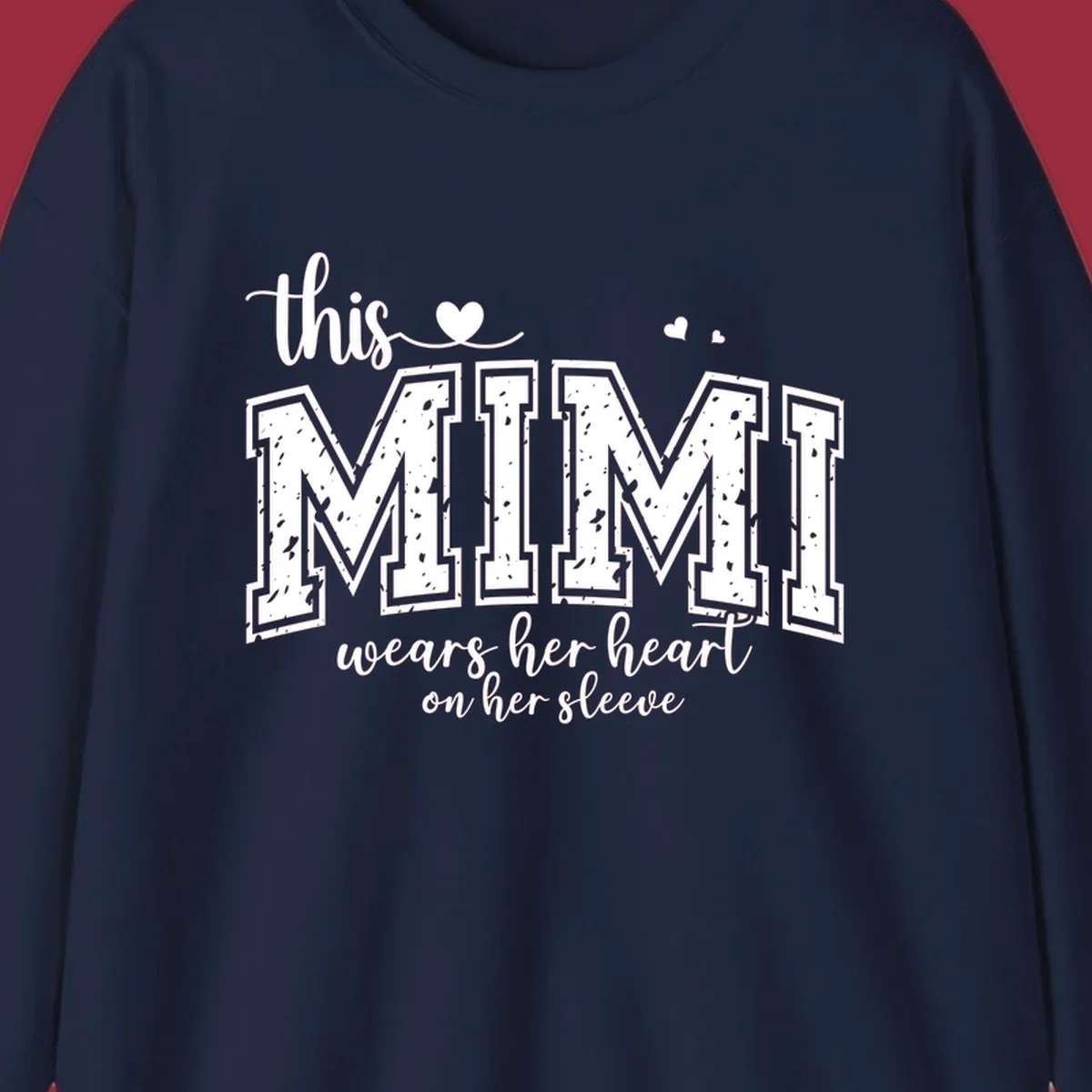 This Mimi Wears Her Heart On Her Sleeve text design with heart icons.