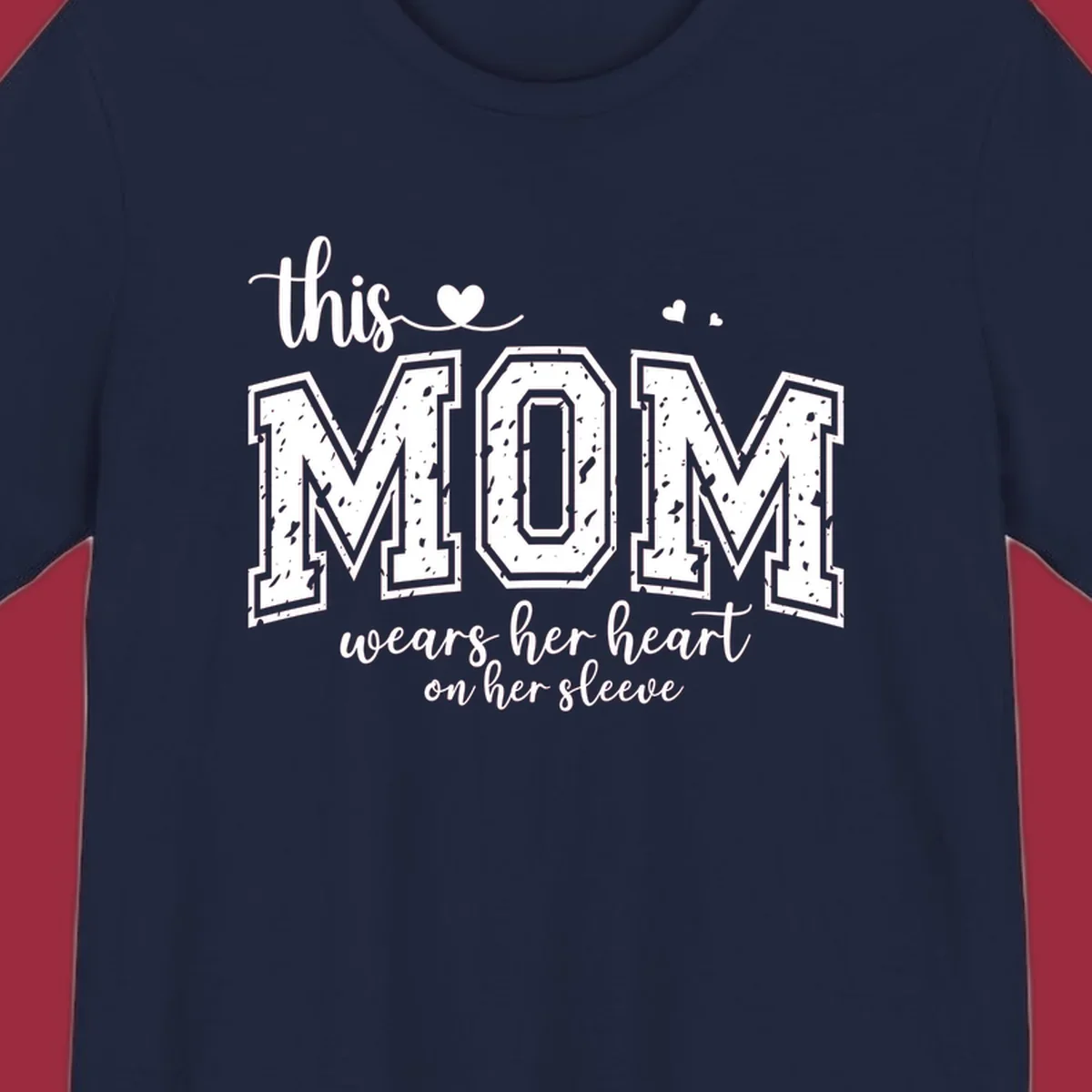 This mom wears her heart on her sleeve graphic with distressed text and heart icons.