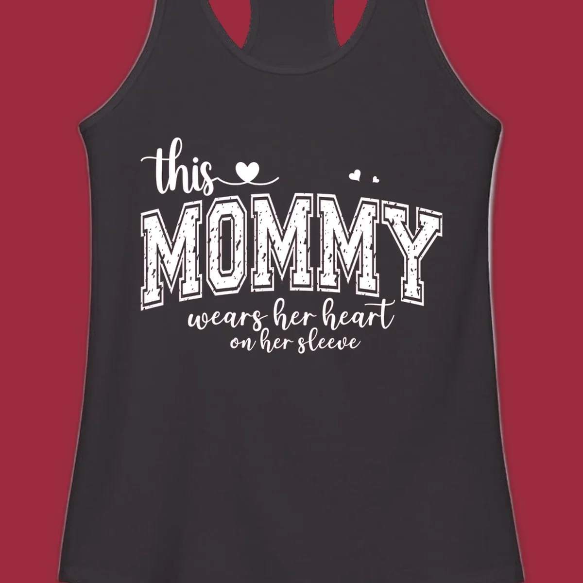 This Mommy Wears Her Heart On Her Sleeve text design with hearts.