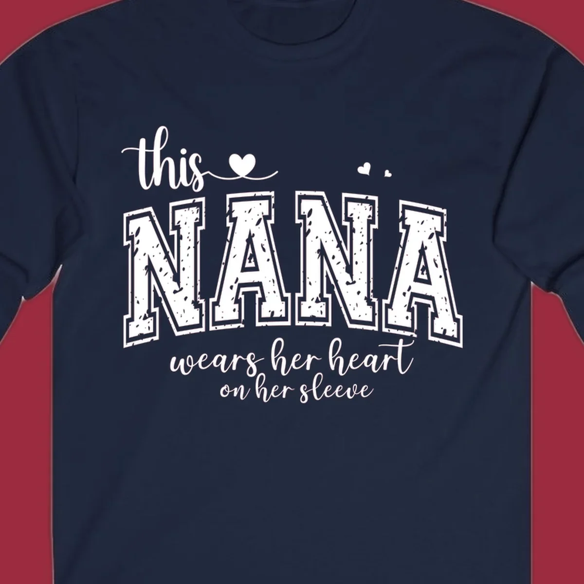 Text design for Nana that says 'this nana wears her heart on her sleeve' with heart accents.