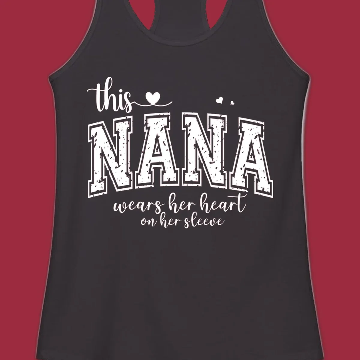 Text design for Nana that says 'this nana wears her heart on her sleeve' with heart accents.