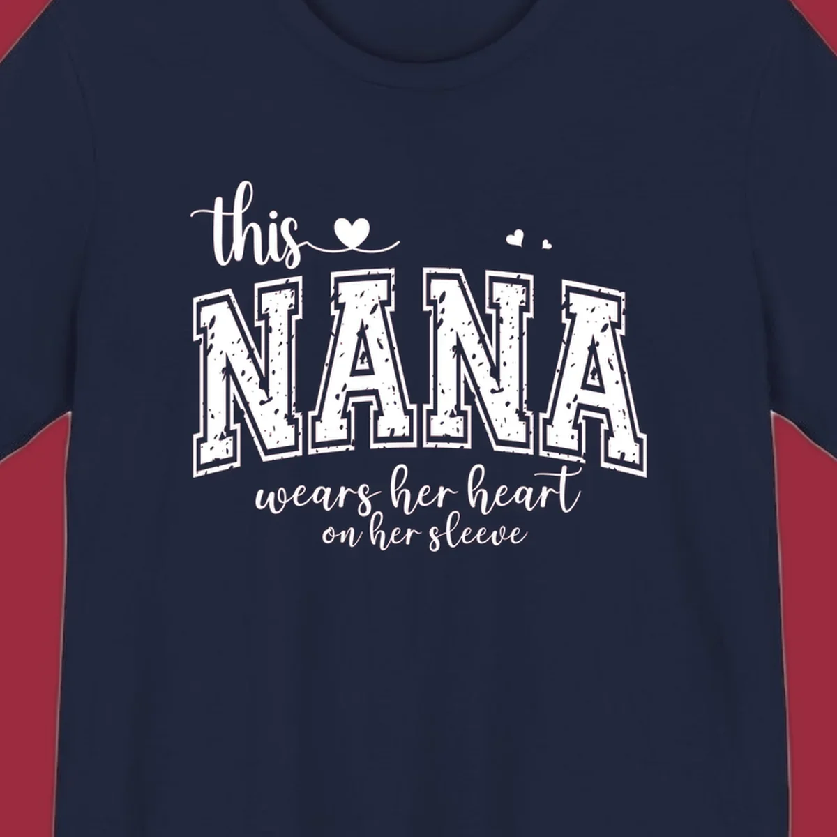Text design for Nana that says 'this nana wears her heart on her sleeve' with heart accents.