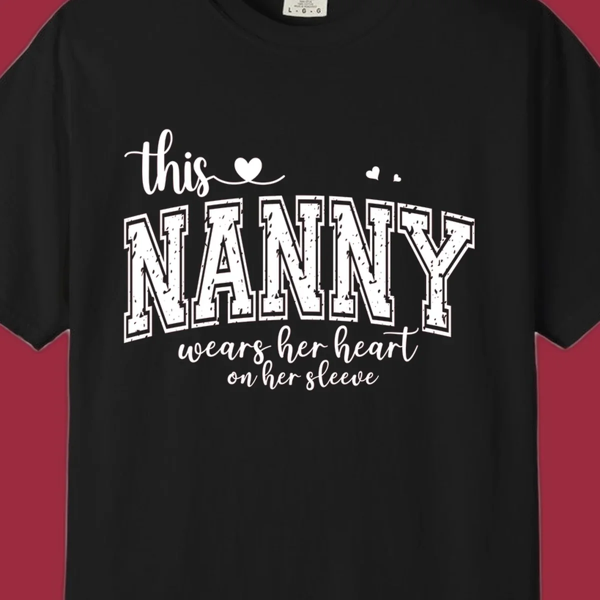This Nanny Wears Her Heart On Her Sleeve typography design with hearts.