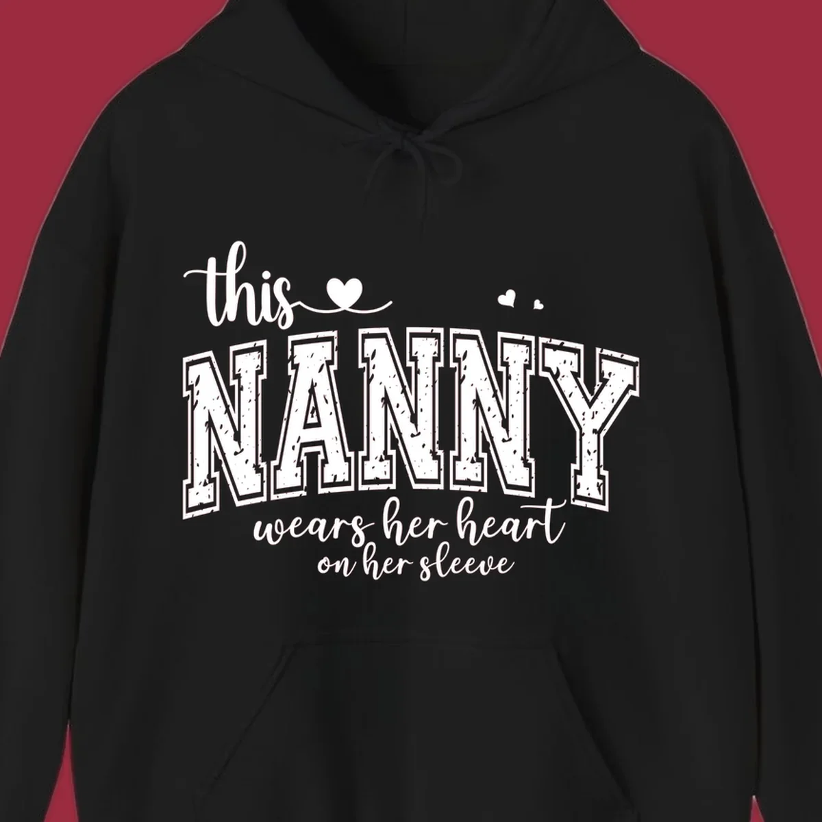 This Nanny Wears Her Heart On Her Sleeve typography design with hearts.