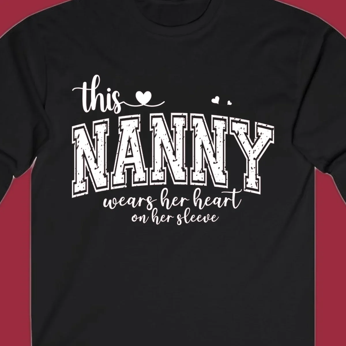 This Nanny Wears Her Heart On Her Sleeve typography design with hearts.